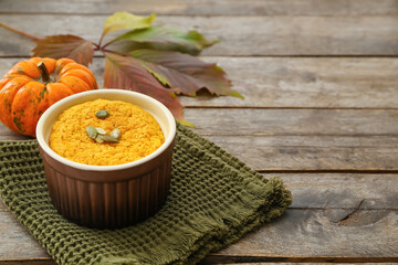 Tasty pumpkin pudding on table