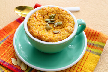 Tasty pumpkin pudding on table