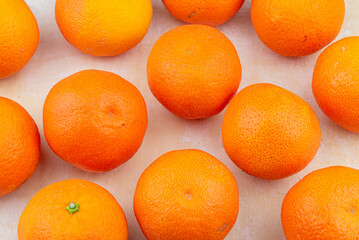 Multitude of oranges, tipically containing vitamin C.