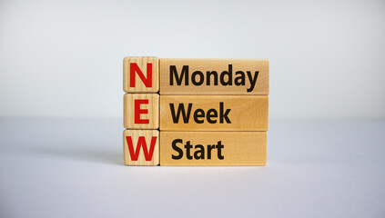 Concept words 'New monday week start' on cubes and blocks on a beautiful white background. Business and new monday concept. Copy space.