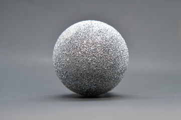 silver christmas ball isolated on gray background
