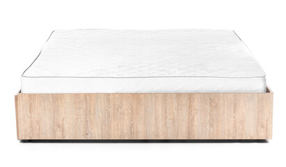 Bed with modern orthopedic mattress on white background