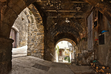 A narrow street among the old houses of Pacentro, a medieval village in the Abruzzo region.