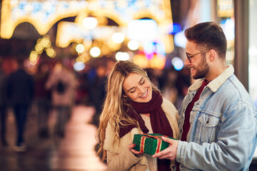 Man surprise woman for Christmas, Valentine's day