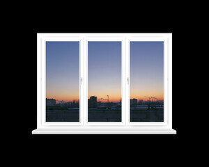 Panoramic window with view of red sunset above city buildings isolated on black