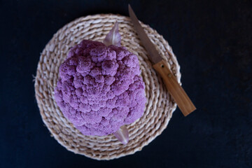 Purple cauliflower on black background