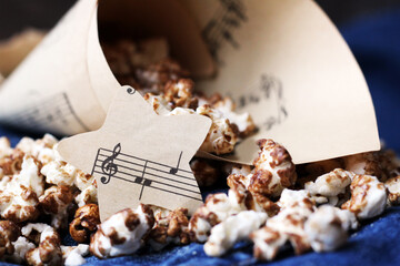Star of paper notes and popcorn