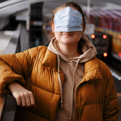 A passenger on public transport with an incorrect face mask