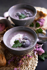 purple sweet potato soup. Red cabbage soup.Vegetable soup.Autumn cuisine.