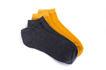 two pairs of colored short socks on a white background, top view