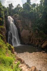 Fototapeta na wymiar Upright photography Long exposure of Heo Narok waterfall in Khoa Yai National park, ThailandUpright photography of Thailand