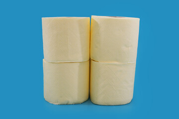  rolls of toilet paper on a blue background.