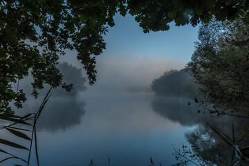 Nadeje pond with fog in summer morning near Hluboka nad Vltavou town
