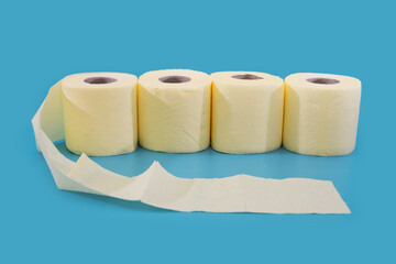  rolls of toilet paper on a blue background.