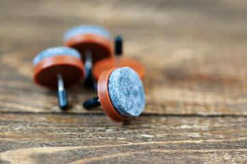 Fisk for furniture on a wooden background