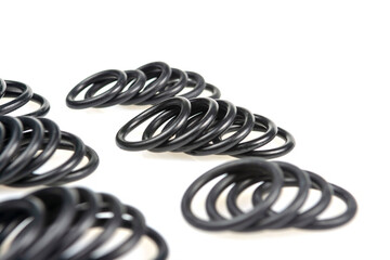 Naklejka premium several sealing rings of different sizes in black close-up