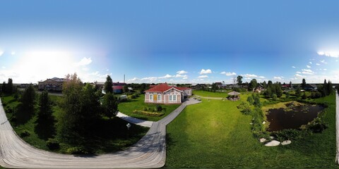 Fototapeta na wymiar July, 2020 - Lomonosovo village. Panoramic view of the village of Lomonosovo. Russia, Arkhangelsk region