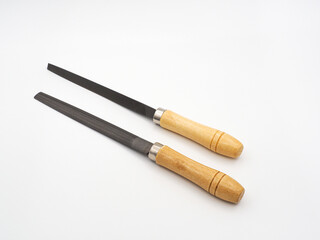 Two metal files with wooden handles. Carpenter's tool on a white background.