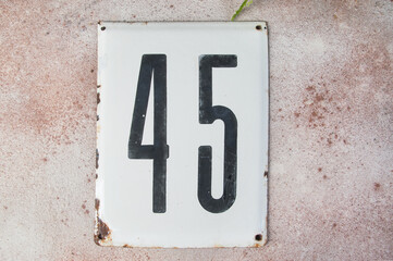 Old house number sign
