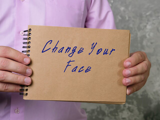 Lifestyle concept about Change Your Face with phrase on the piece of paper.