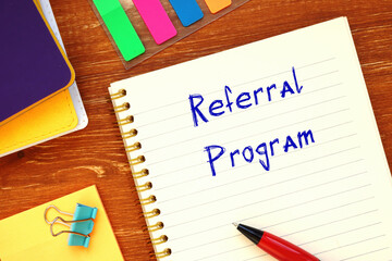 Business concept about Referral Program with sign on the sheet.