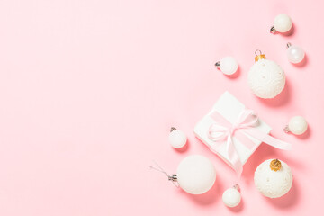 Christmas pink flat lay background with holiday decorations.