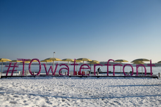 Purple stick art for HTO Waterfront Park at Harbourfront Toronto with frozen Lake Ontario and snow in winter Toronto, Canada - February 14, 2018