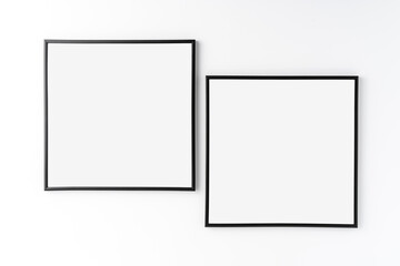 Two picture frames on white background. Mockup with copyspace