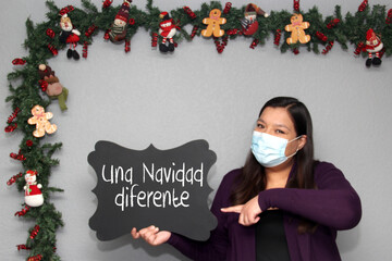 Latin woman with protection mask and blackboard with 