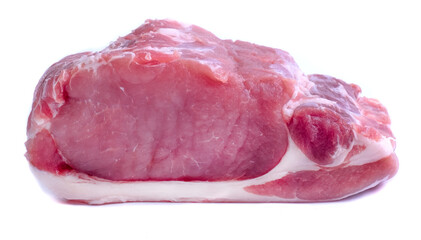 Fresh piece of pork on a white plate. Insulation. Close-up.