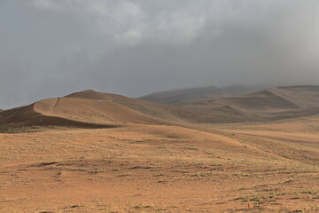 Fototapeta na wymiar Early morning-misty light over the Badain Jaran Desert. Inner Mongolia-China-1134