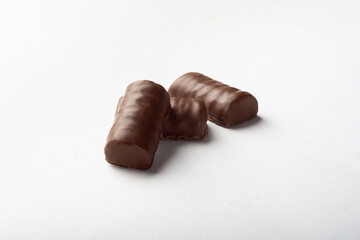 Candy on a white background for isolation. Chocolate candies with soft filling on a white background.