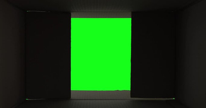 Inside of carton box bottom view, green screen. Woman close empty parcel. Worldwide express delivery concept. Transition or opener for your project