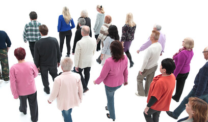 top view. group of confident elderly people striding forward