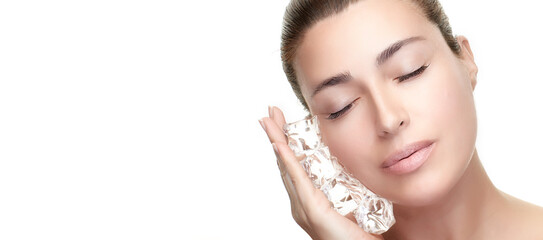Healthy clean skin girl. Spa Face Woman applies ice cubes on face. Cold Beauty Treatments