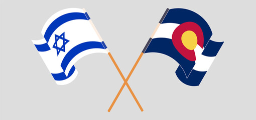 Crossed and waving flags of Israel and The State of Colorado