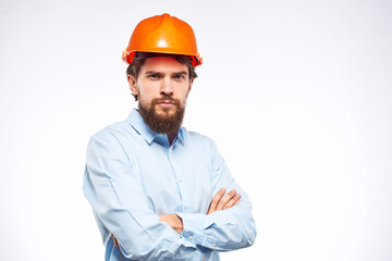 Worker man in orange paint engineer emotions industry construction