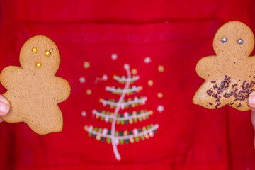 Gingerbread Man cookie on red Christmas background