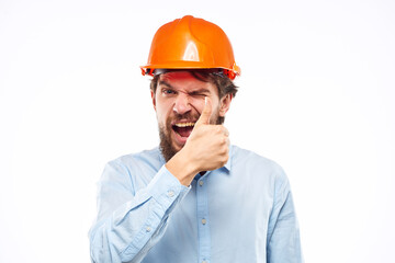 Emotional man Construction worker orange hard hat engineer Professional