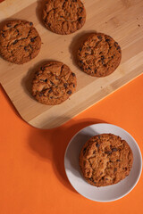homemade cookies in minimalism style on bright ginger surface