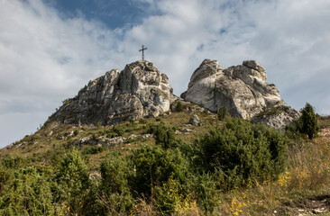 The cross on the background of clear sky at the top Biaklo (or Maly Giewont) near Olsztyn near Czestochowa