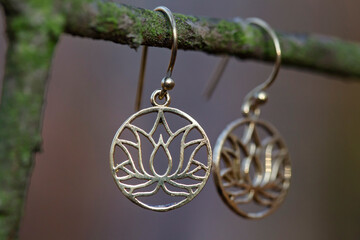 brass earrings in the shape of lotus in mandala