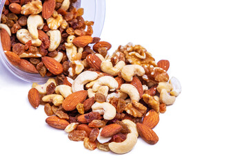 assortment of dried fruit spilled and isolated on white