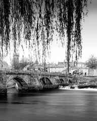 View of Dee river and the Old Dee Bridge in Chester, Cheshire, at sunset, Black and White long...
