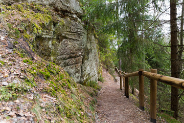 Sandstone cliffs with a wooden trail - tourism, Gaujas National park, Latvia