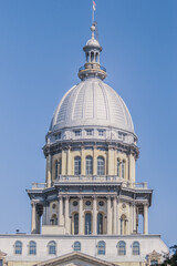 Fototapeta na wymiar Springfield IL State Capital Building with beautiful, soft light and light blue sky.