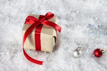Fototapeta na wymiar Christmas card background. Christmas decoration background. New Year's and Christmas. Christmas background. Gift in the snow. Gift. Copyspace