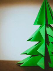 Decorative Christmas tree toy made of green paper