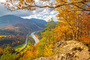 Naklejka na ściany i meble Autumn landscape with the Vah river. The Mala Fatra national park, Slovakia, Europe.