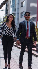 Fototapeta premium Emperor couple walking in the city